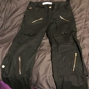 Long black pants with zippers and pockets